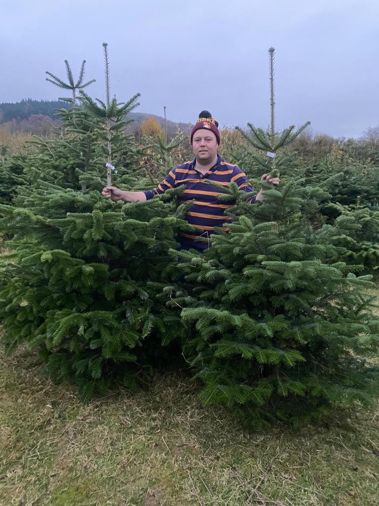 Tm Pritchard in field with trees Tm Pritchard in field with trees